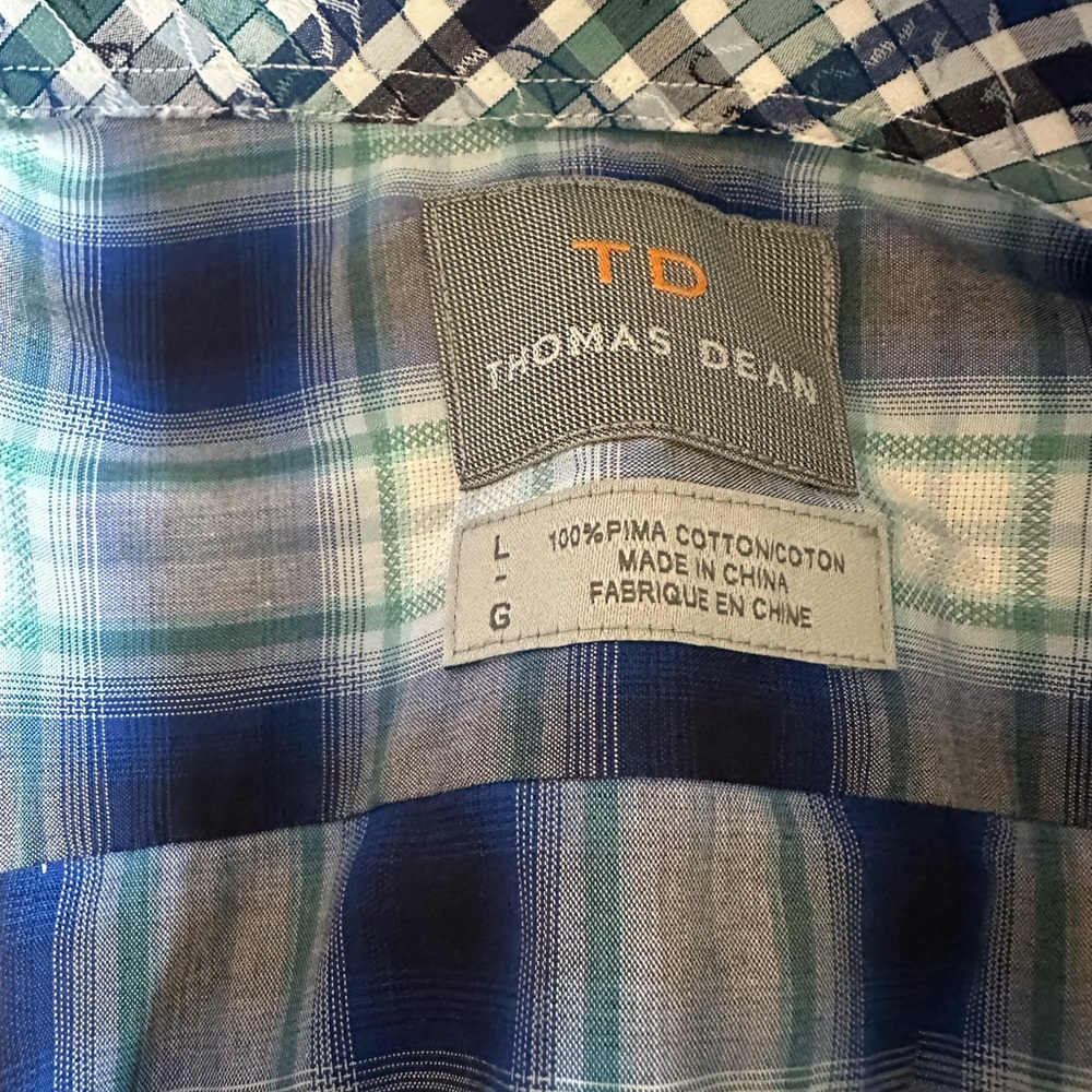 Very nice Thomas Dean button down shirt. Never worn. No tags.
